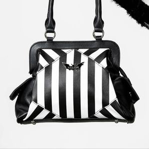 NEVER TRUST THE LIVING HANDBAG